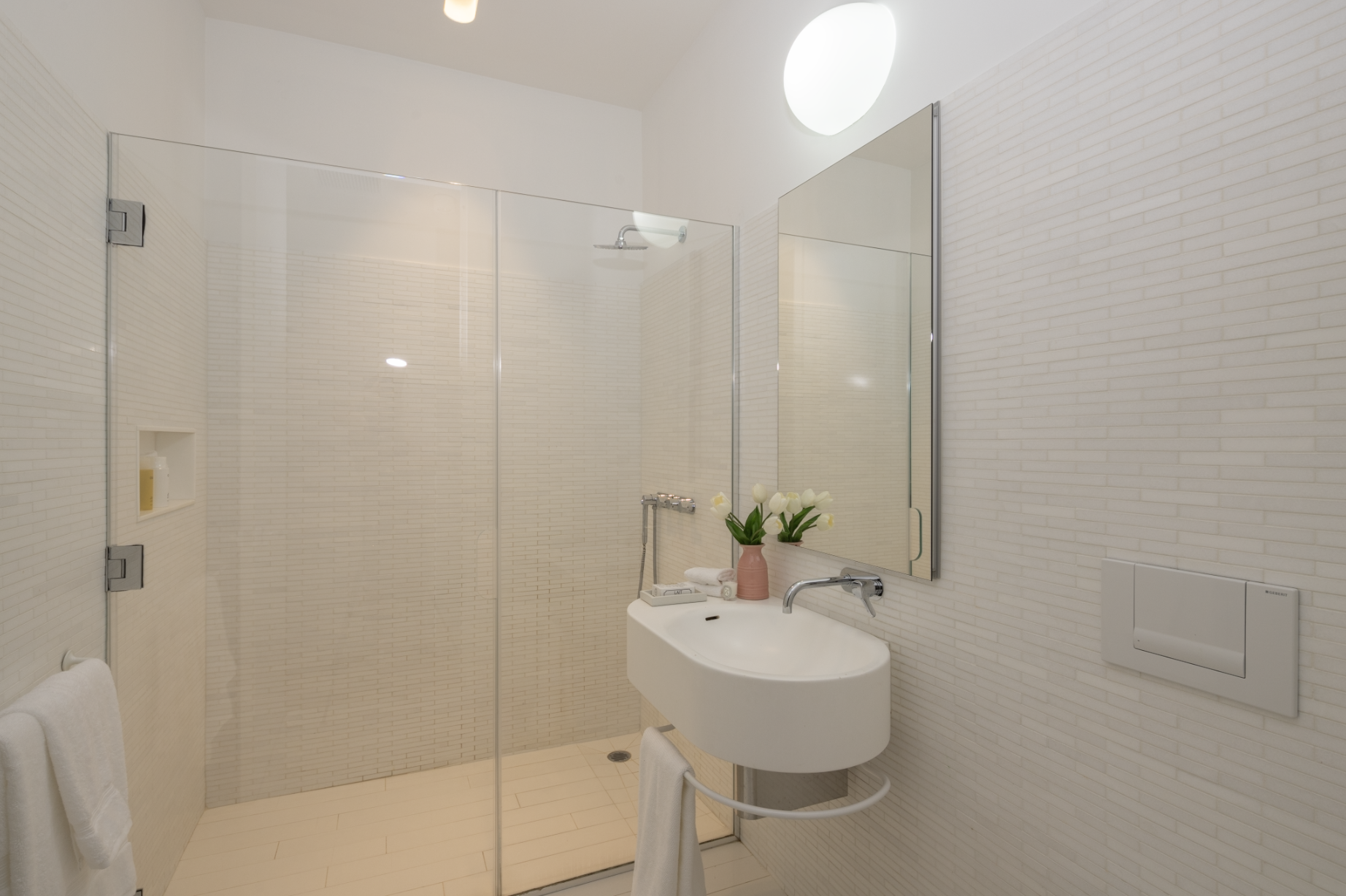 56 Leonard Street, Unit 14BEAST Manhattan, NY 10013 - Photo 17 of 35 a bathroom with a sink and mirror