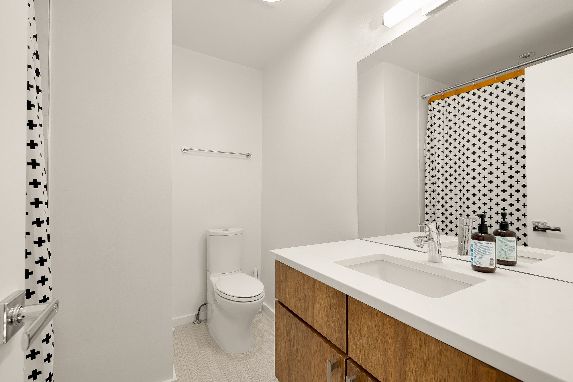 2710 Brandywine Street Northwest Washington, DC 20008 - Photo 48 of 74 a bathroom with a sink a toilet and mirror