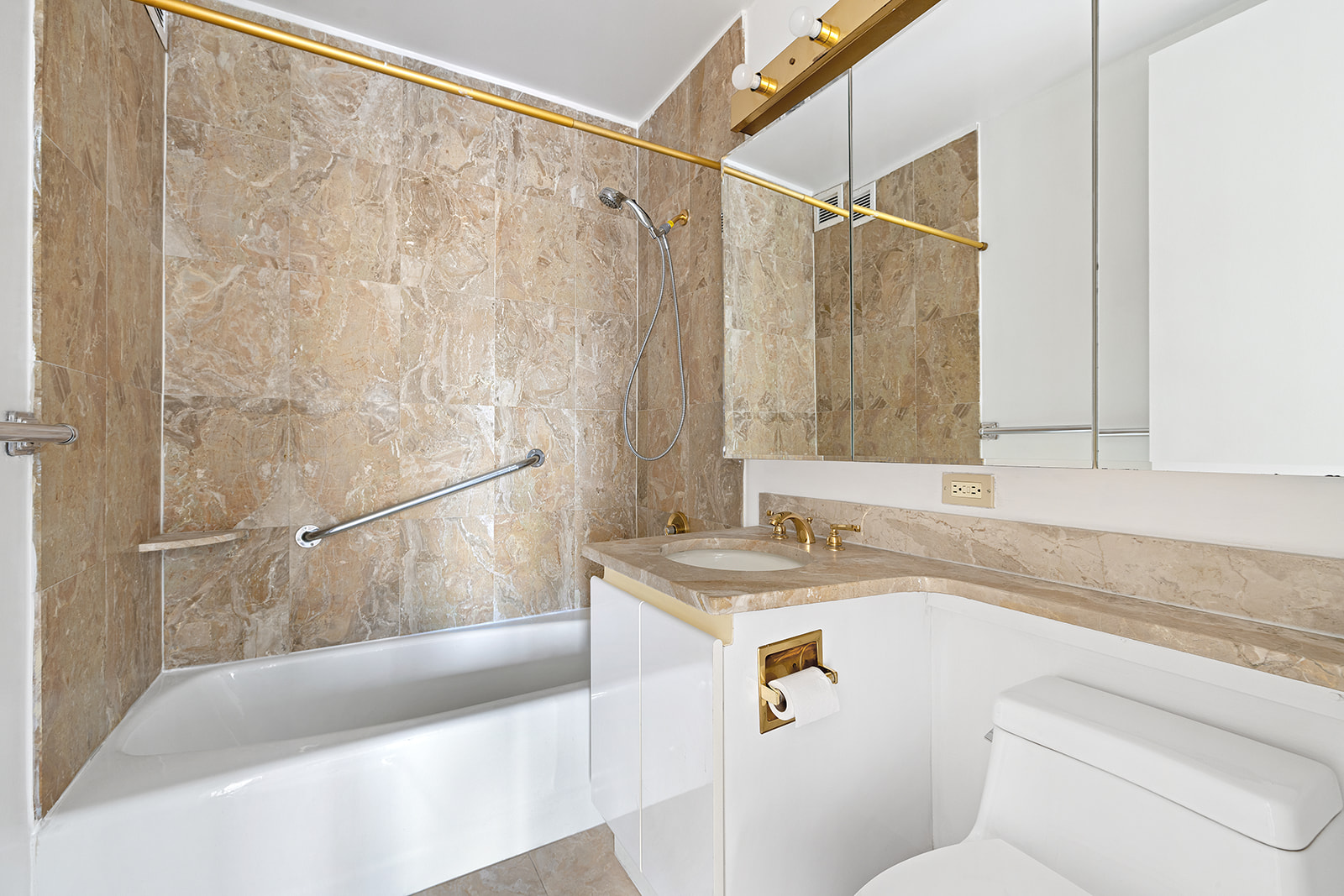 170 East 87th Street, Unit W15H Manhattan, NY 10128 - Photo 8 of 13 a bathroom with a sink and a bathtub