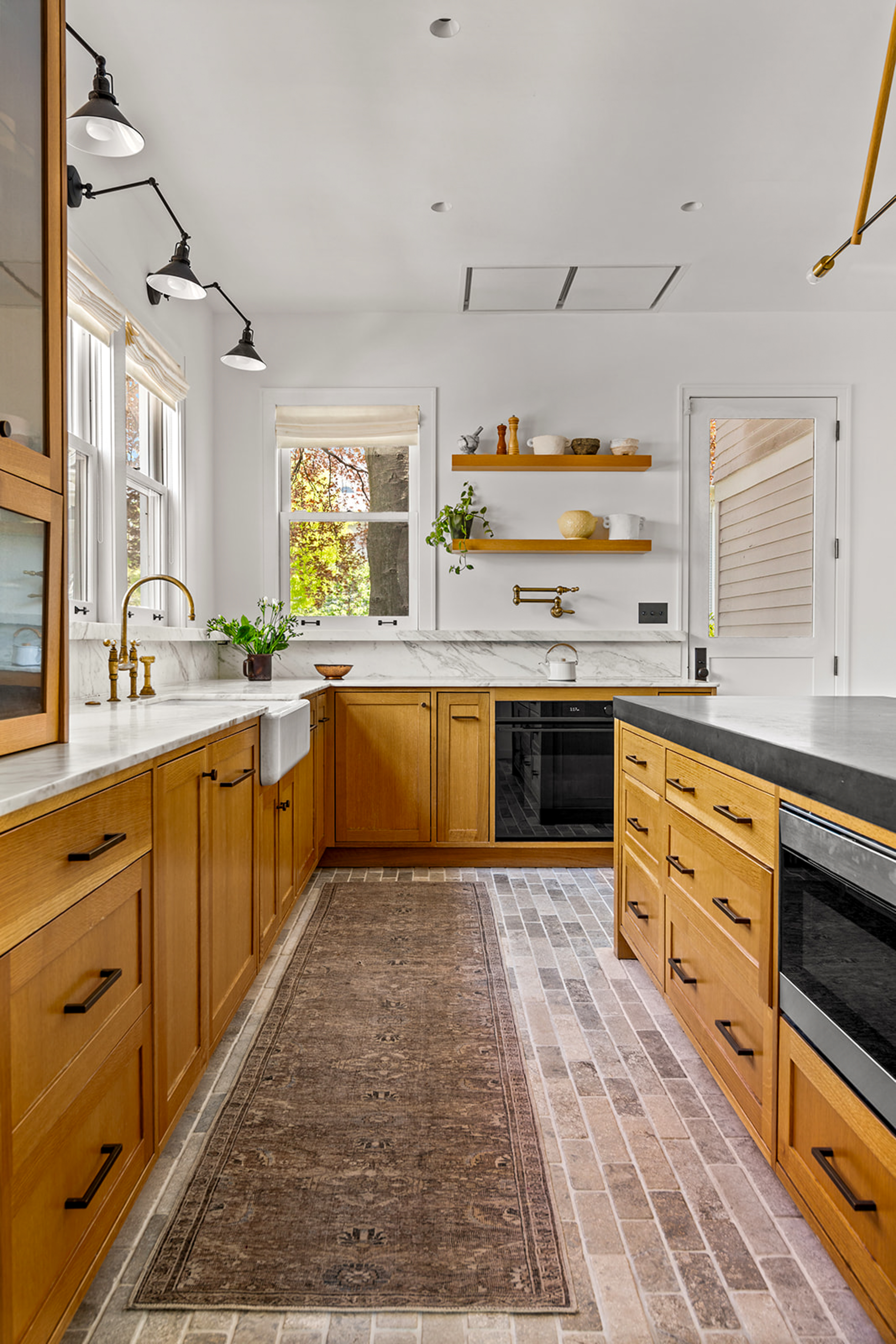1221 Albemarle Road Brooklyn, NY 11218 - Photo 14 of 45 a large kitchen with stainless steel appliances granite countertop a stove and cabinets