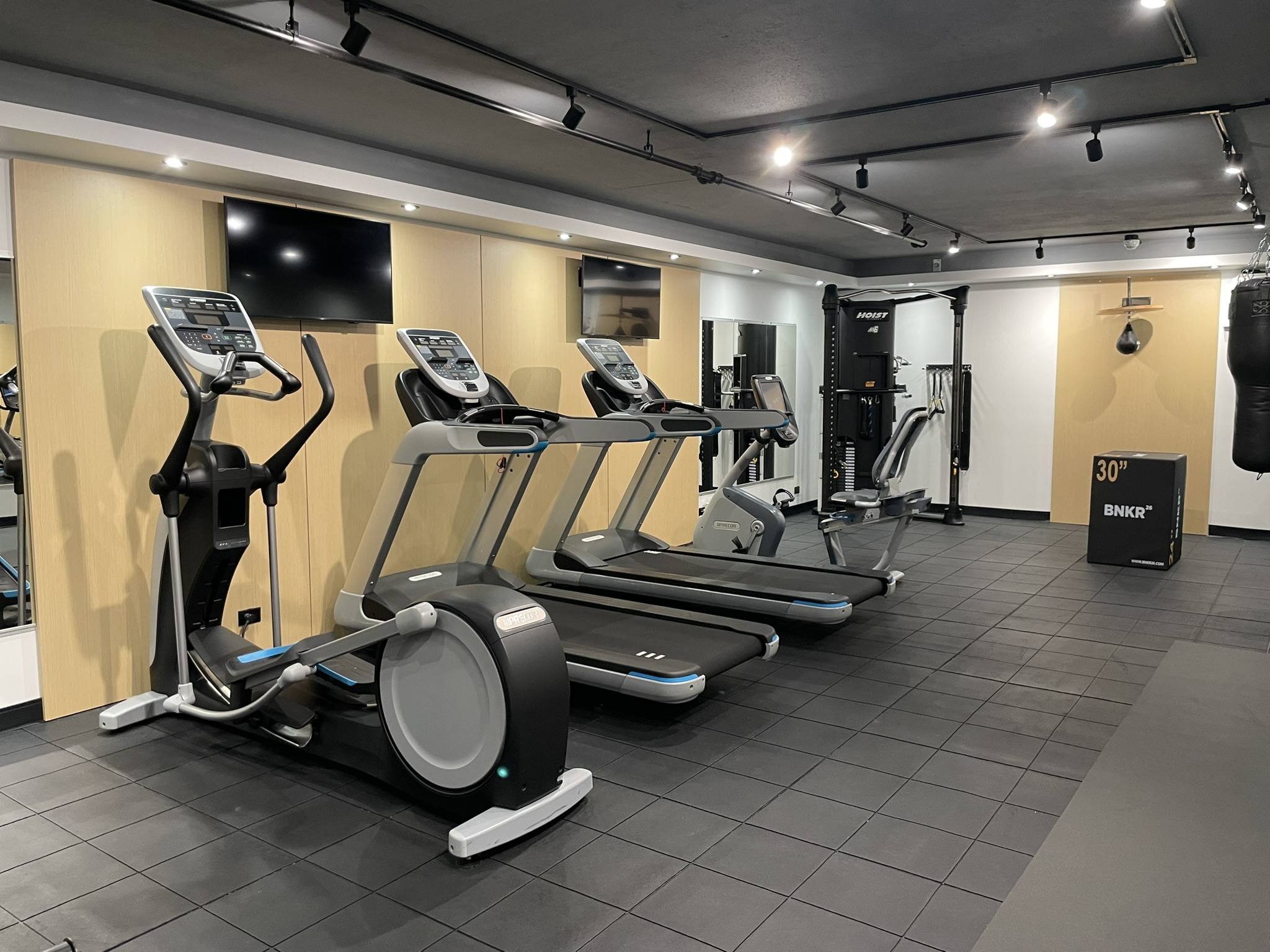 44-14 Douglaston Parkway, Unit 3B Queens, NY 11363 - Photo 11 of 12 a view of a room with gym equipment