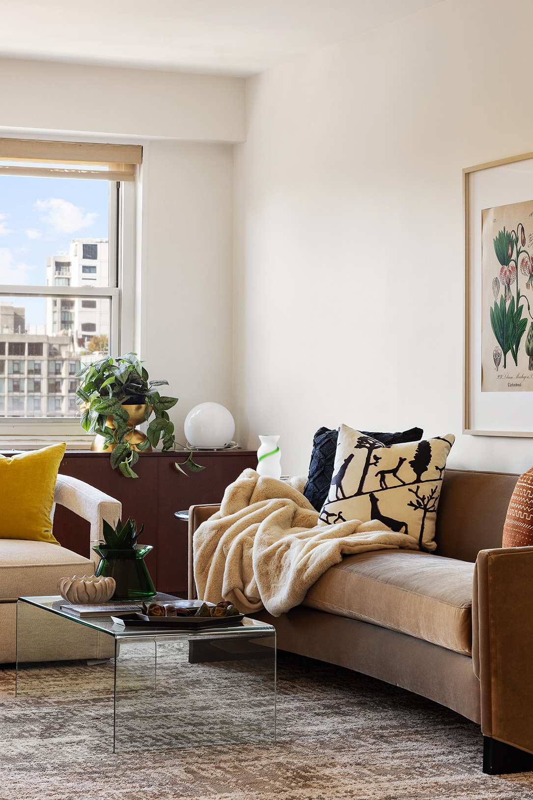 360 West 22nd Street, Unit 12B Manhattan, NY 10011 - Photo 3 of 16 a living room with furniture