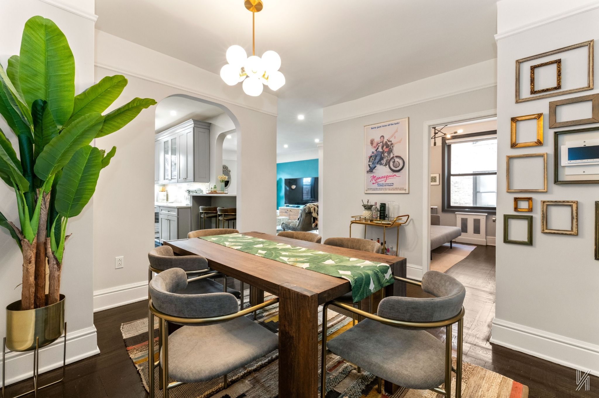 35-06 88th Street, Unit 3G Queens, NY 11372 - Photo 10 of 20 a view of a dining room with furniture a chandelier and wooden floor