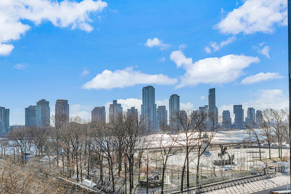 a view of a city with tall buildings