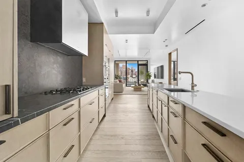 a large kitchen with cabinets