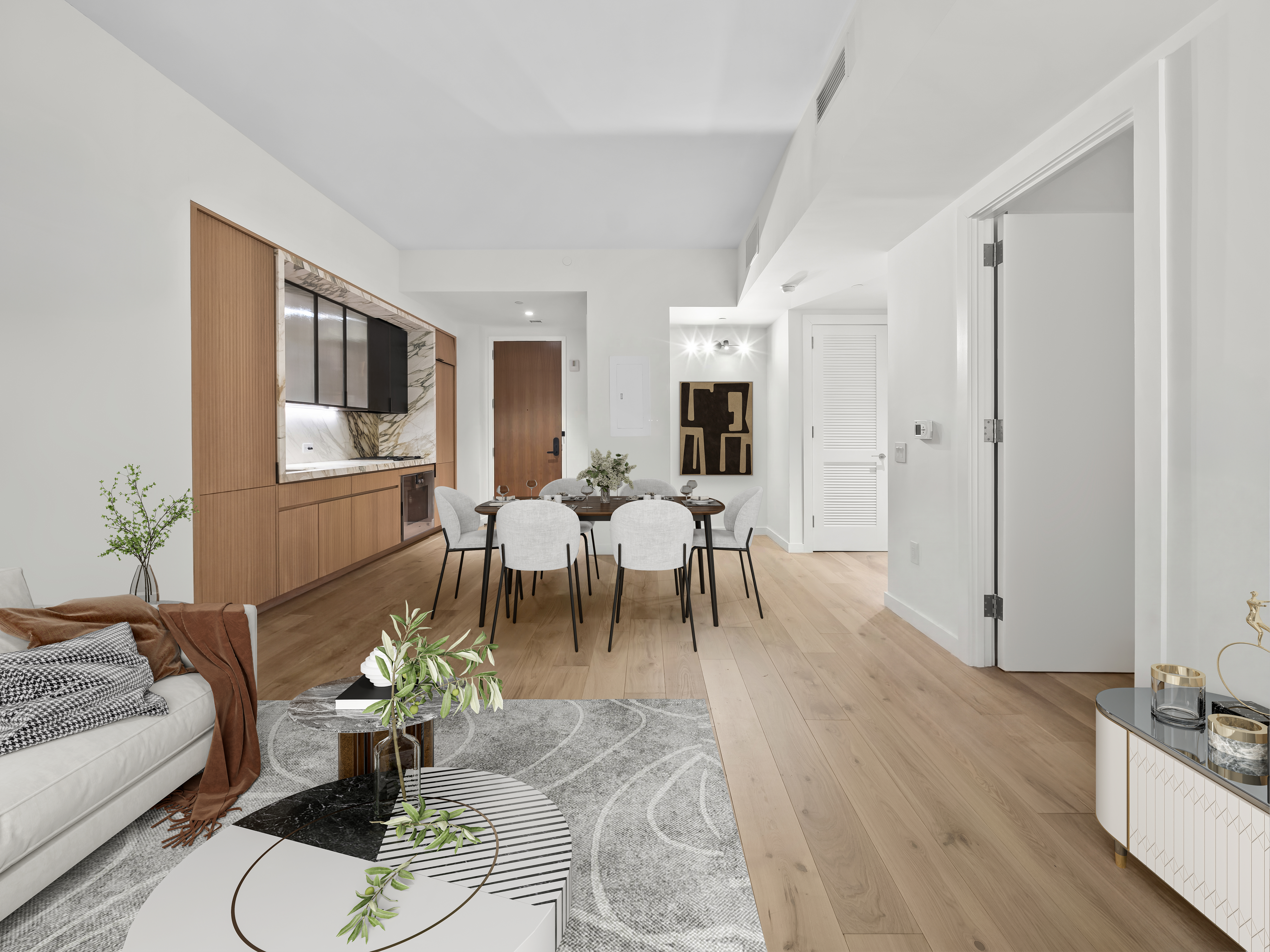 135 East 47th Street, Unit 4F Manhattan, NY 10017 - Photo 1 of 11 a living room with furniture and wooden floor