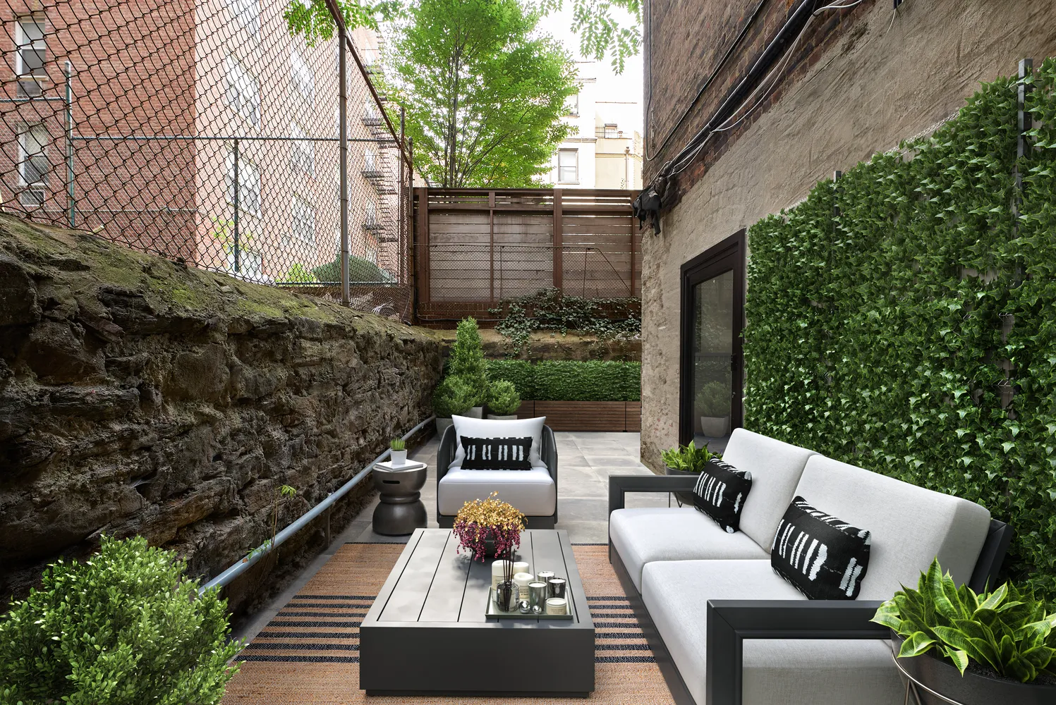a view of balcony with couch and outdoor seating