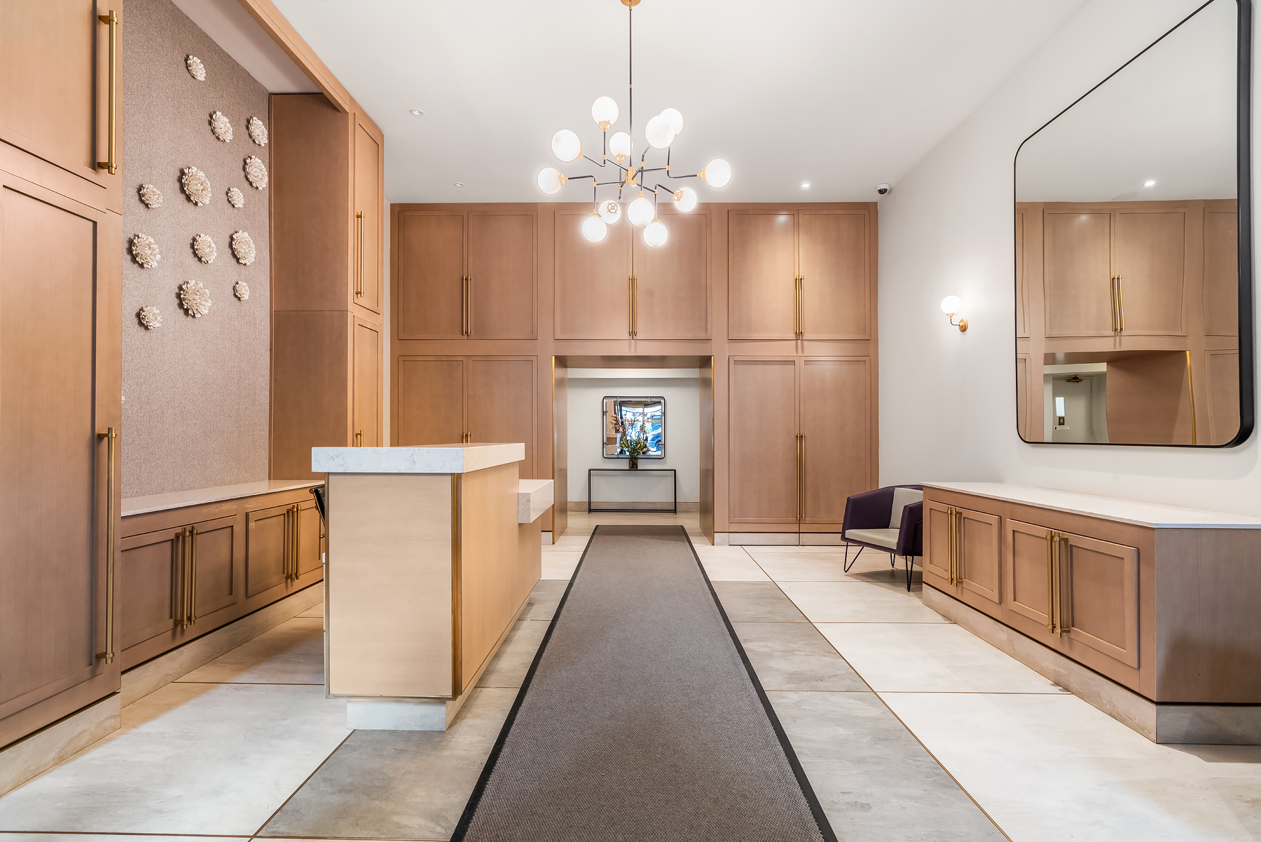 178 East 80th Street, Unit 3A Manhattan, NY 10075 - Photo 10 of 14 a view of a kitchen with a sink and refrigerator
