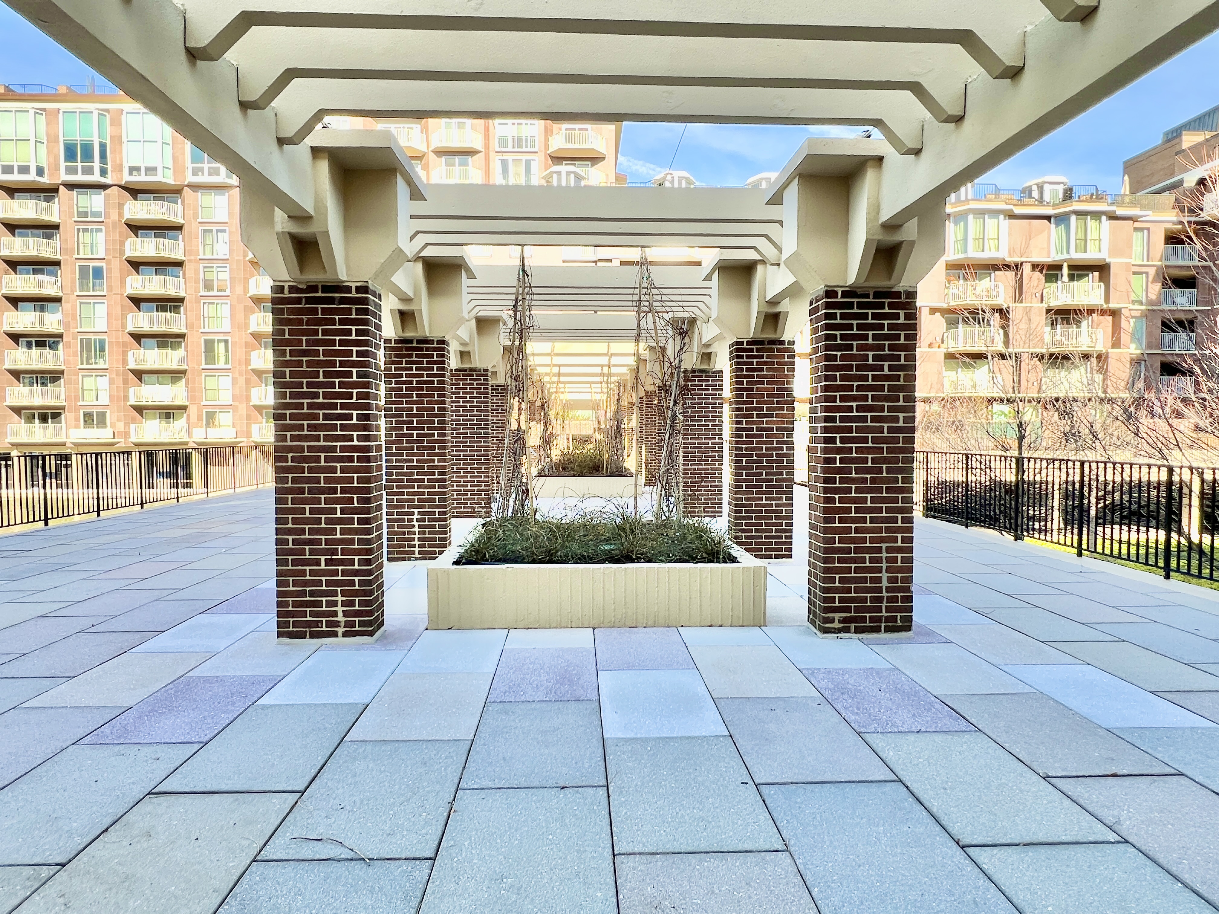 520 N Street Southwest, Unit S112 Washington, DC 20024 - Photo 24 of 40 a view of a pathway both side of building