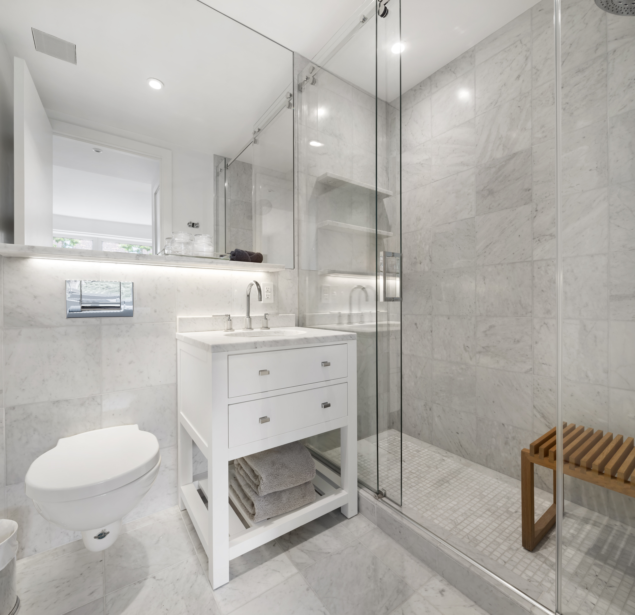 744 Greenwich Street, Unit 4 Manhattan, NY 10014 - Photo 31 of 34 a bathroom with a sink a toilet a mirror and shower