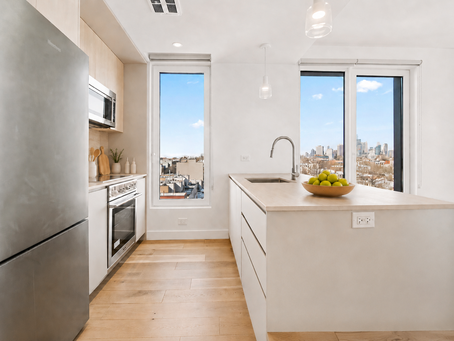 130 2nd Street, Unit 9L Brooklyn, NY 11231 - Photo 4 of 20 a kitchen with stainless steel appliances granite countertop a sink and a stove