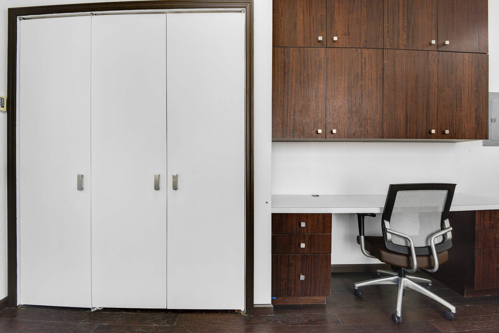 50 West 47th Street, Unit Undisclosed Manhattan, NY 10036 - Photo 20 of 27 a view of workspace with wooden cabinet