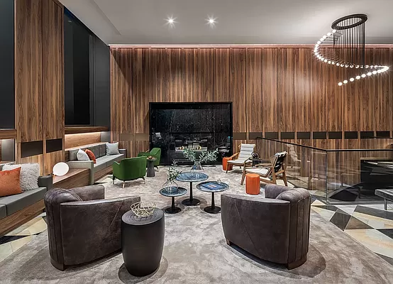 30 East 29th Street, Unit PHB Manhattan, NY 10016 - Photo 10 of 19 a living room with furniture a fireplace and a flat screen tv