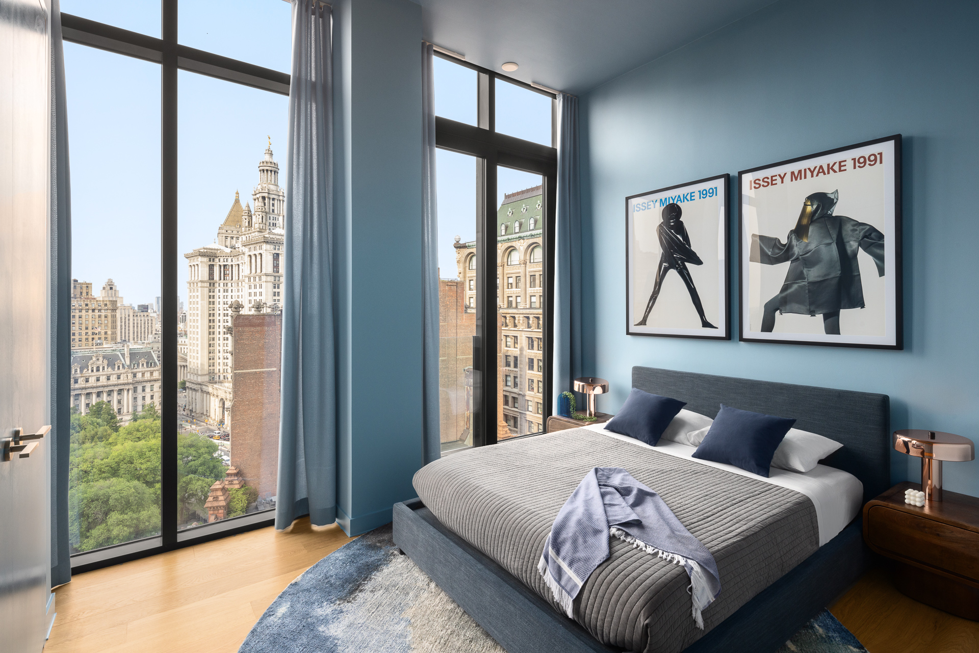 33 Park Row, Unit PH3 Manhattan, NY 10038 - Photo 21 of 30 a bedroom with a bed and a painting on the wall