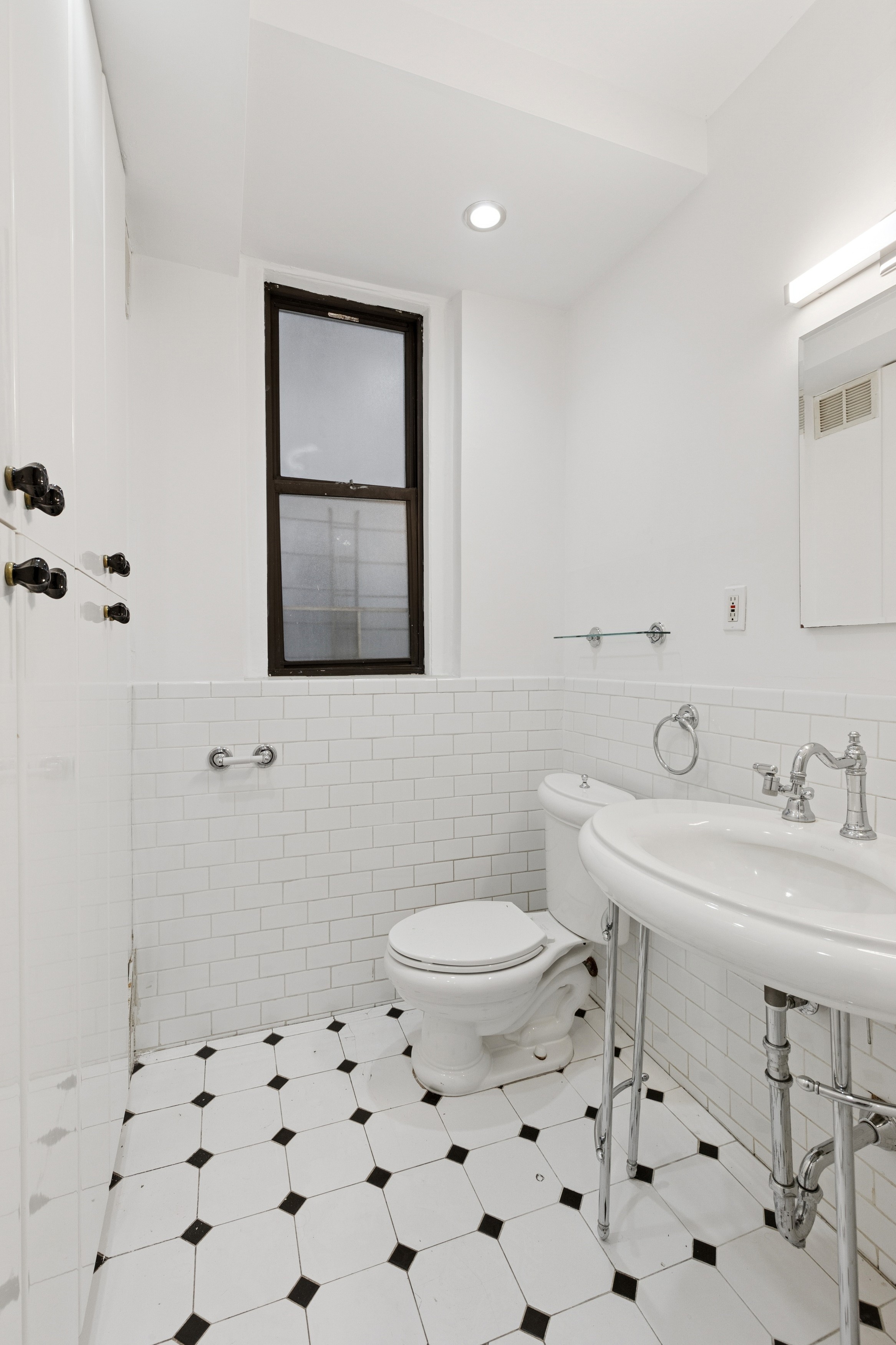804 West 180th Street, Unit 41 Manhattan, NY 10033 - Photo 17 of 23 a bathroom with a sink toilet and shower