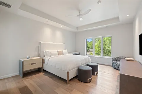 a bed room with a bed and a couch