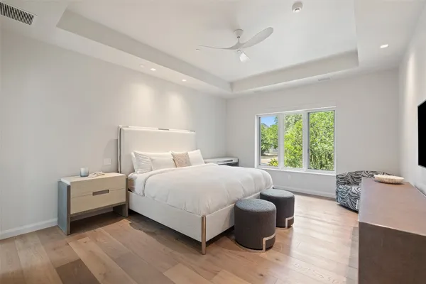 a bed room with a bed and a couch