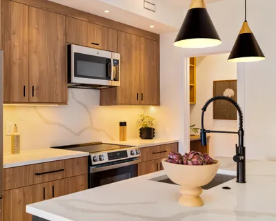 a kitchen with a stove and a microwave