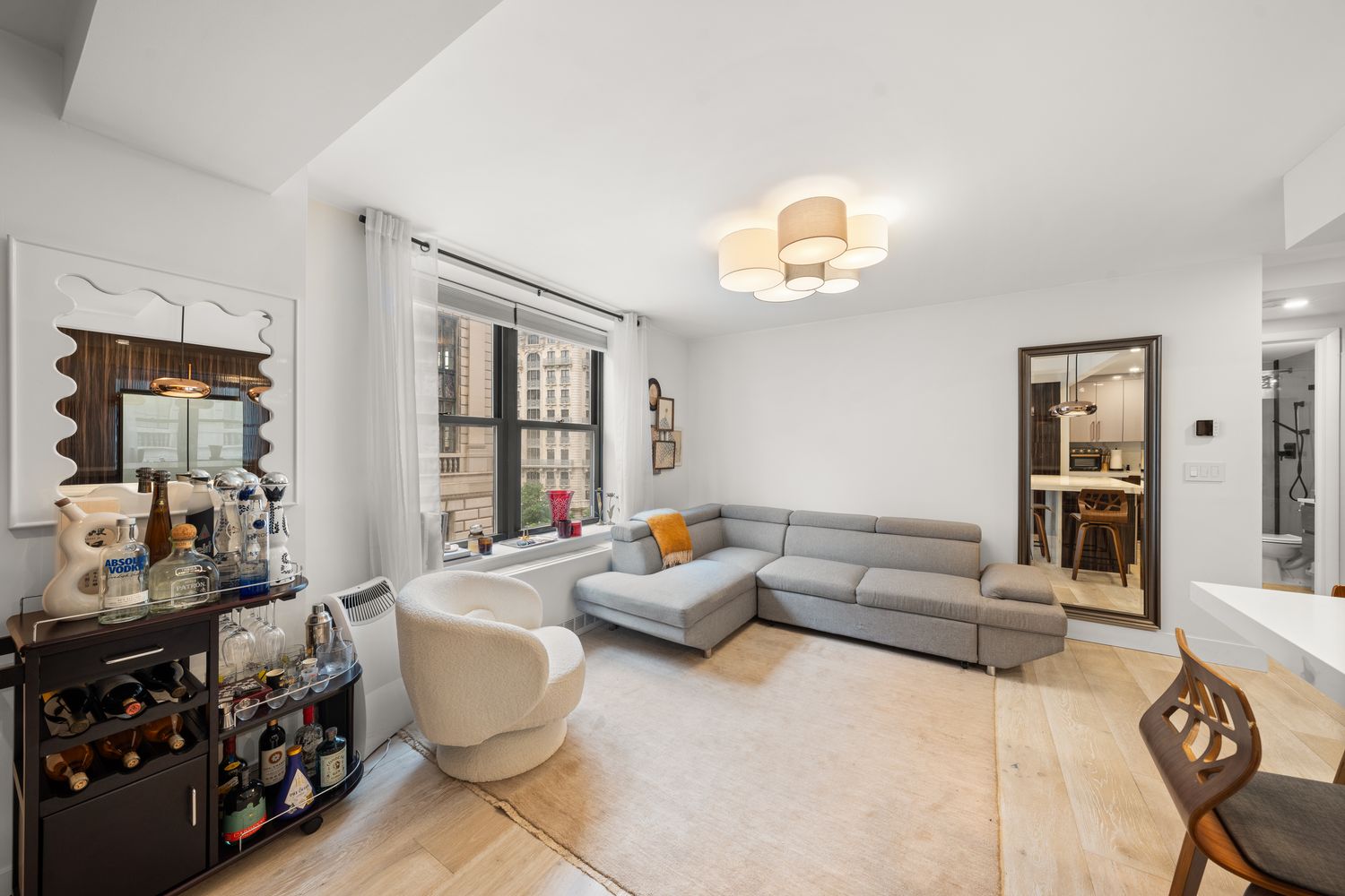 a living room with furniture and a window