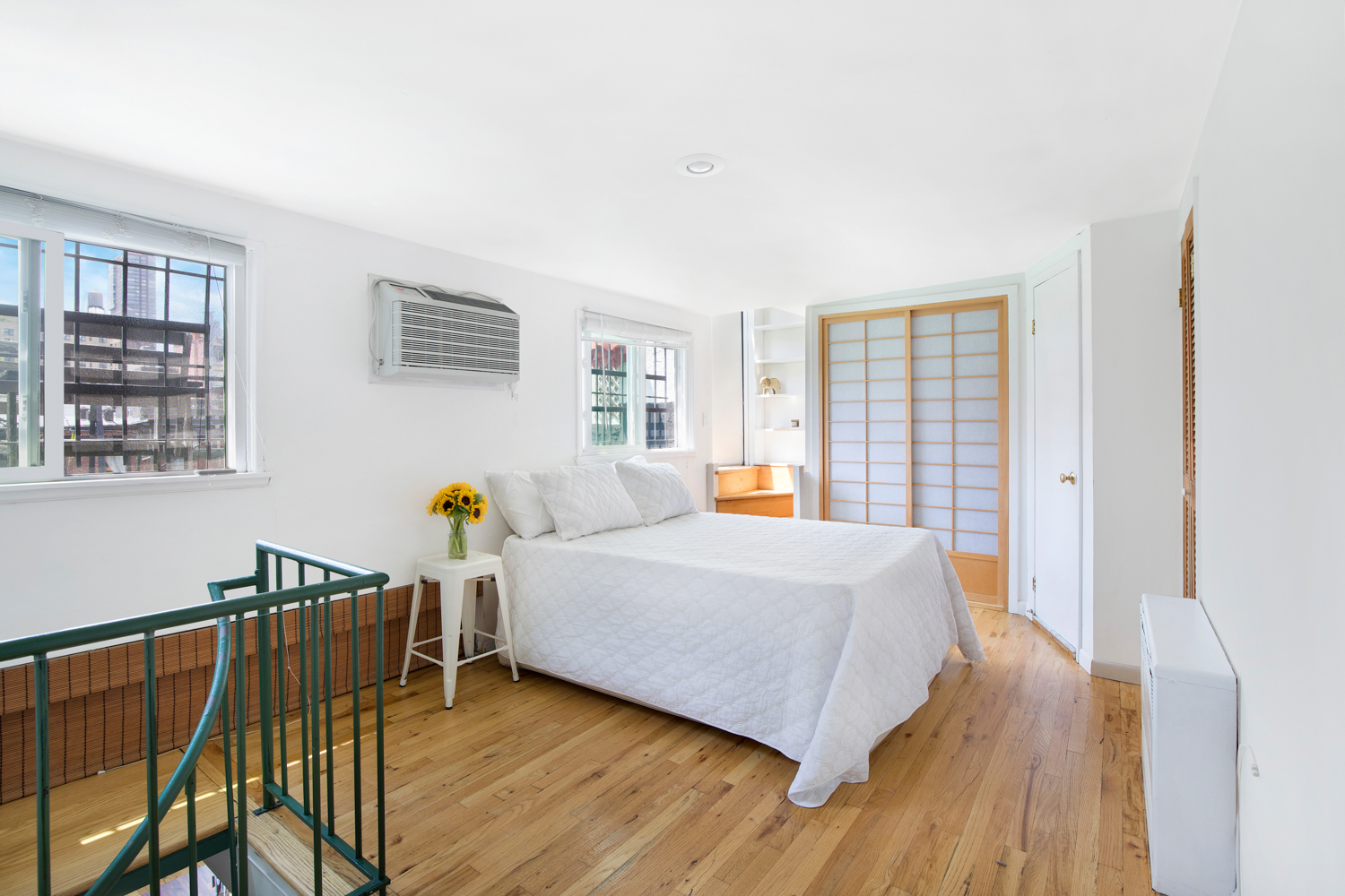 40 West 76th Street, Unit 10 Manhattan, NY 10023 - Photo 4 of 7 a bedroom with furniture and window