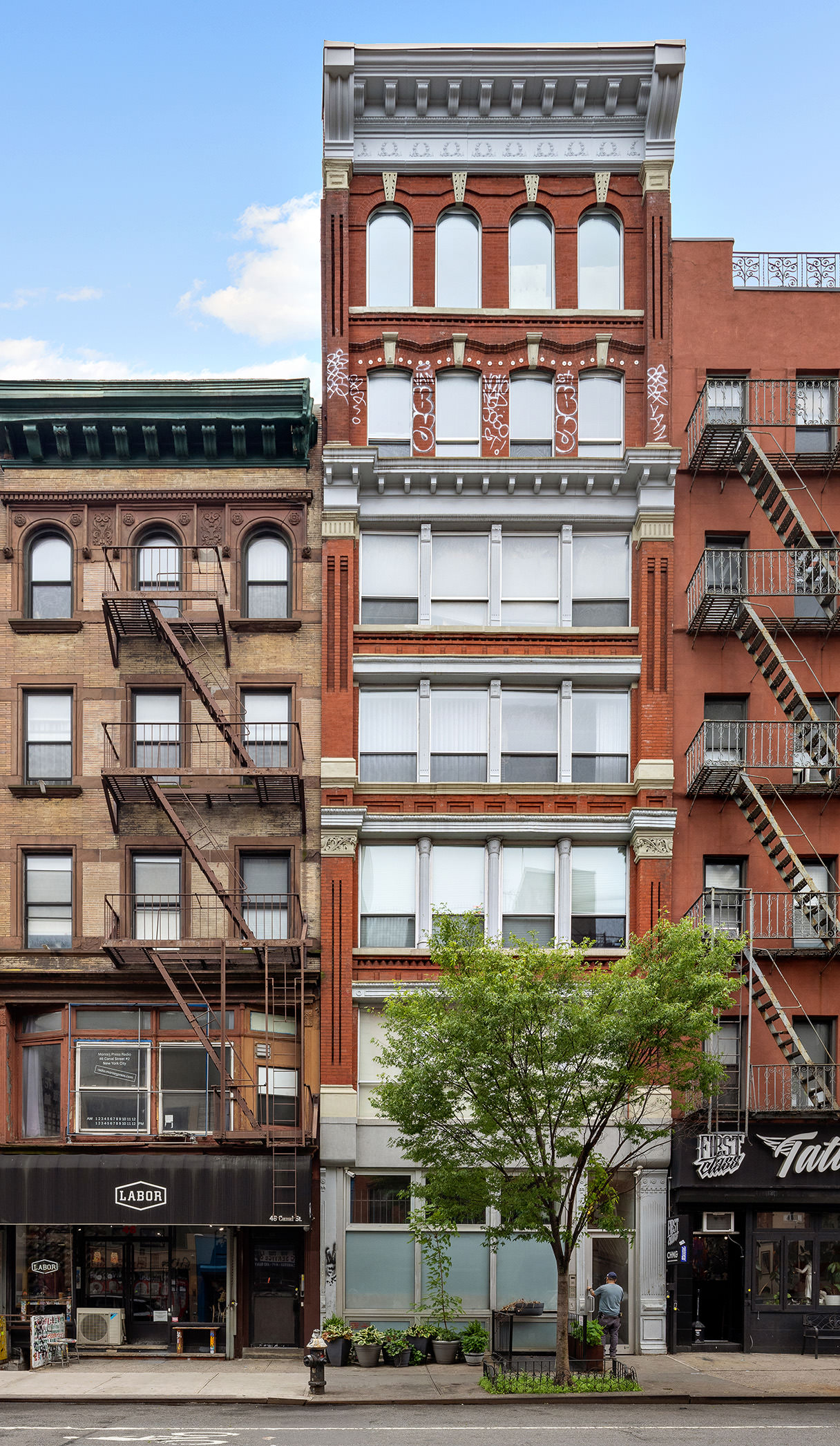 48 Canal Street, Unit 4 Manhattan, NY 10002 - Photo 12 of 13 a front view of a building with a street