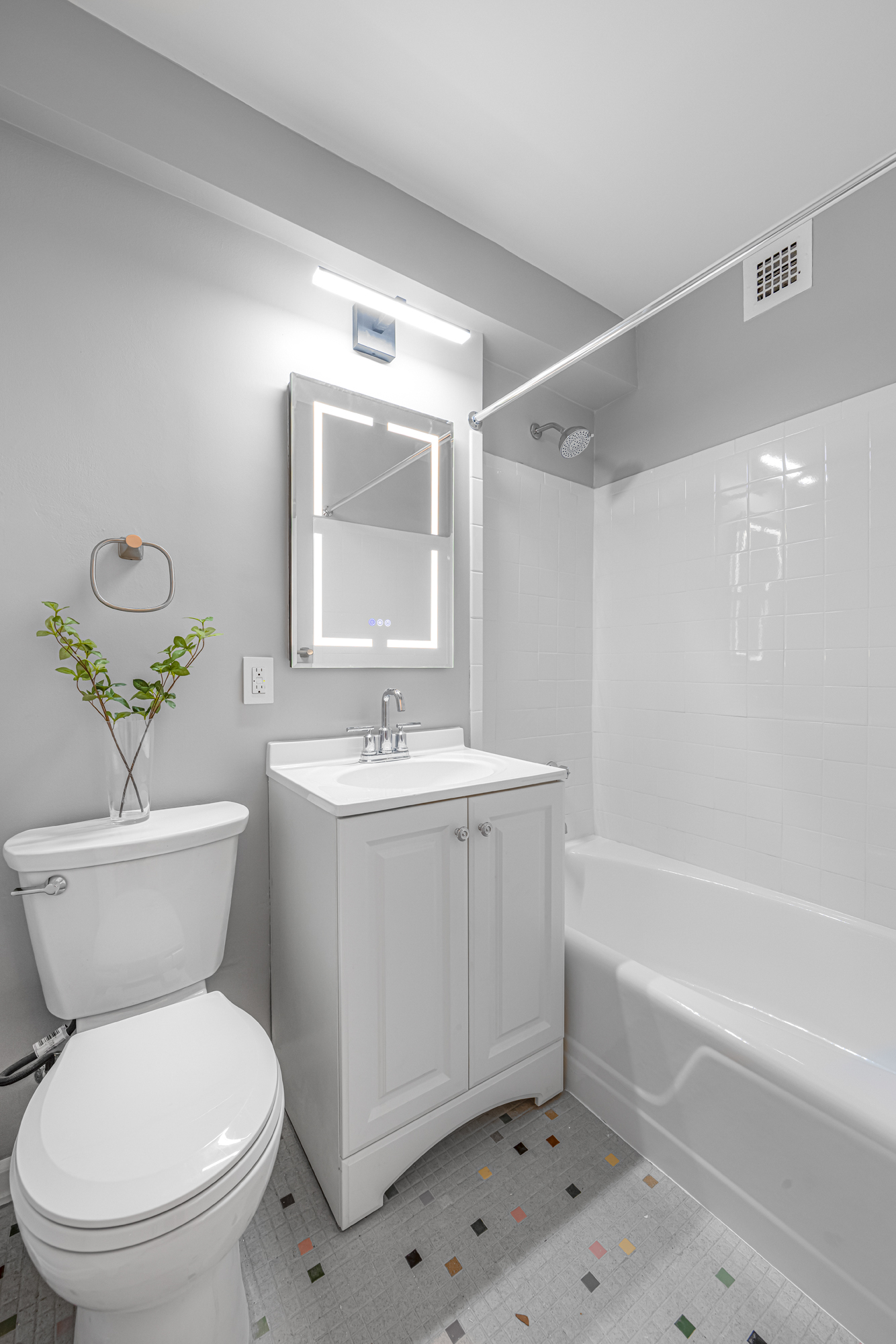 150 East 37th Street, Unit 10F Manhattan, NY 10016 - Photo 11 of 20 a bathroom with a sink toilet and bathtub