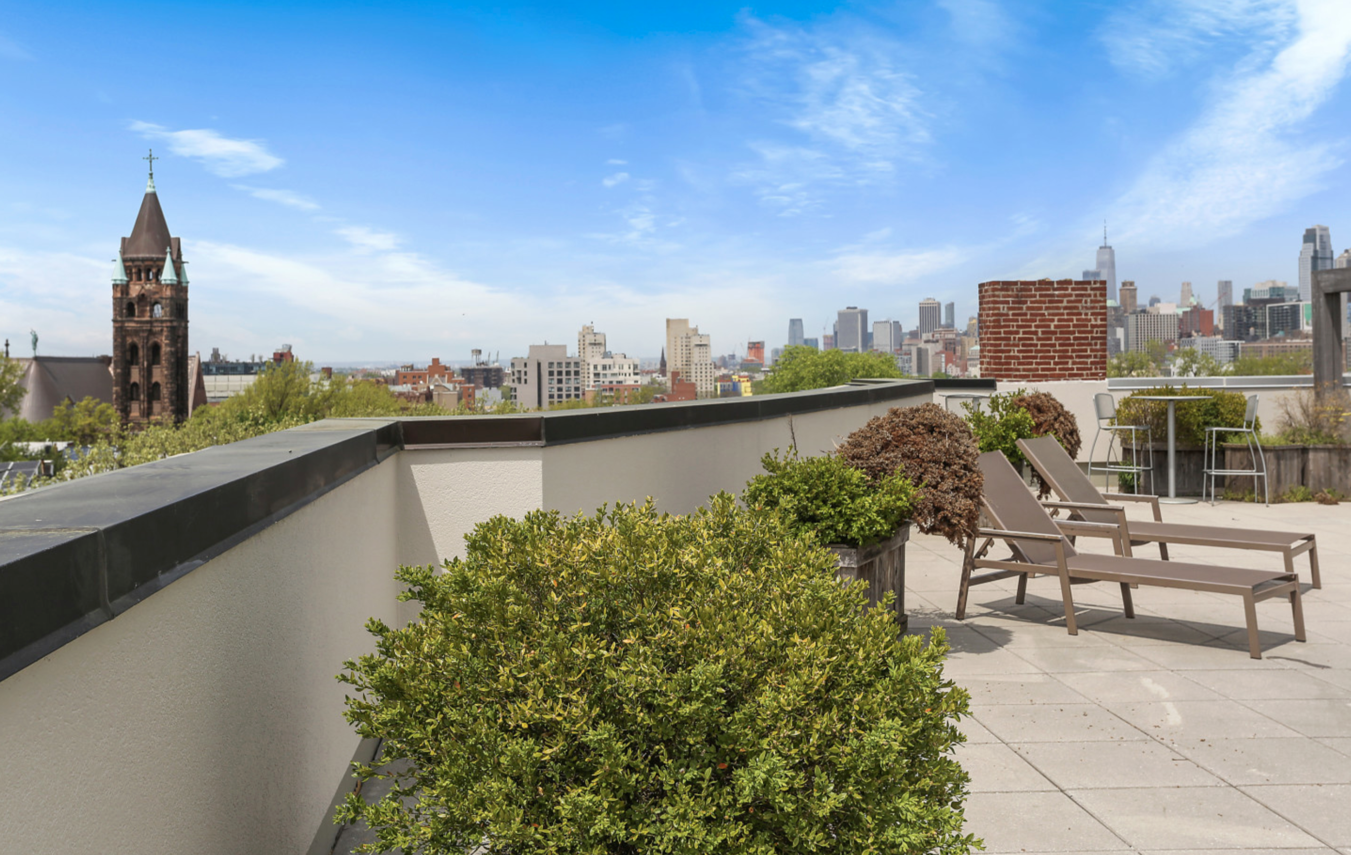 145 Park Place, Unit 6B Brooklyn, NY 11217 - Photo 13 of 17 a view of a city from a terrace