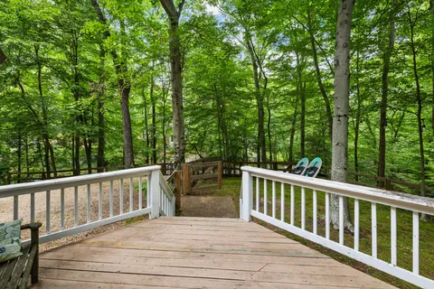 a view of a two chairs in the deck