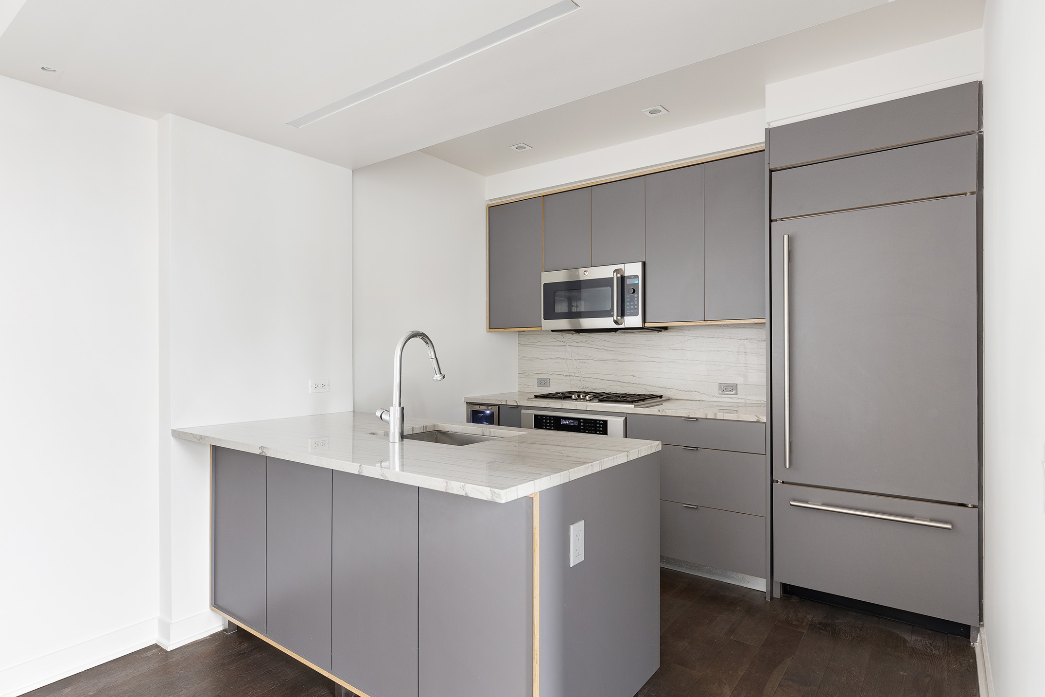 205 Water Street, Unit 7N Brooklyn, NY 11201 - Photo 4 of 11 a kitchen with a refrigerator stove and sink