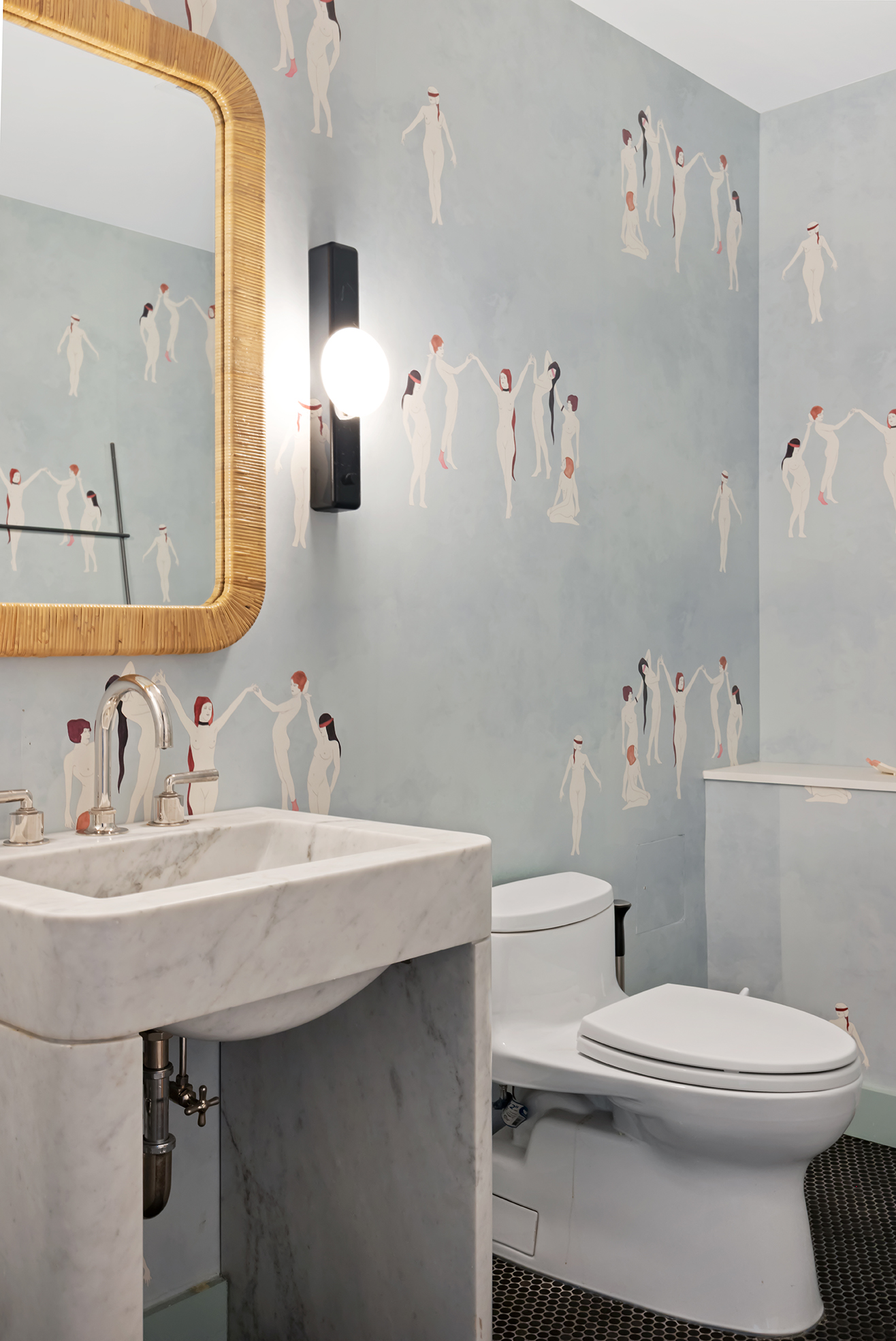 63 Greene Street, Unit PHB Manhattan, NY 10012 - Photo 10 of 17 a bathroom with a sink a toilet and a mirror