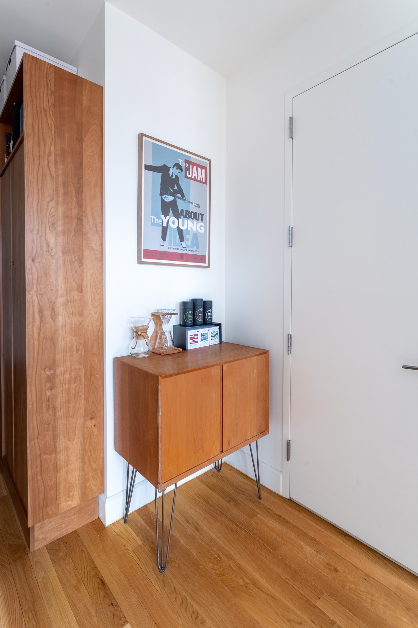 315 Gates Avenue, Unit 4E Brooklyn, NY 11216 - Photo 9 of 17 a workspace with furniture and wooden floor