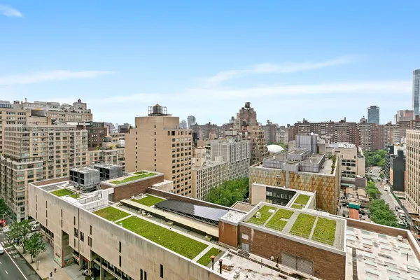 a view of city with tall buildings