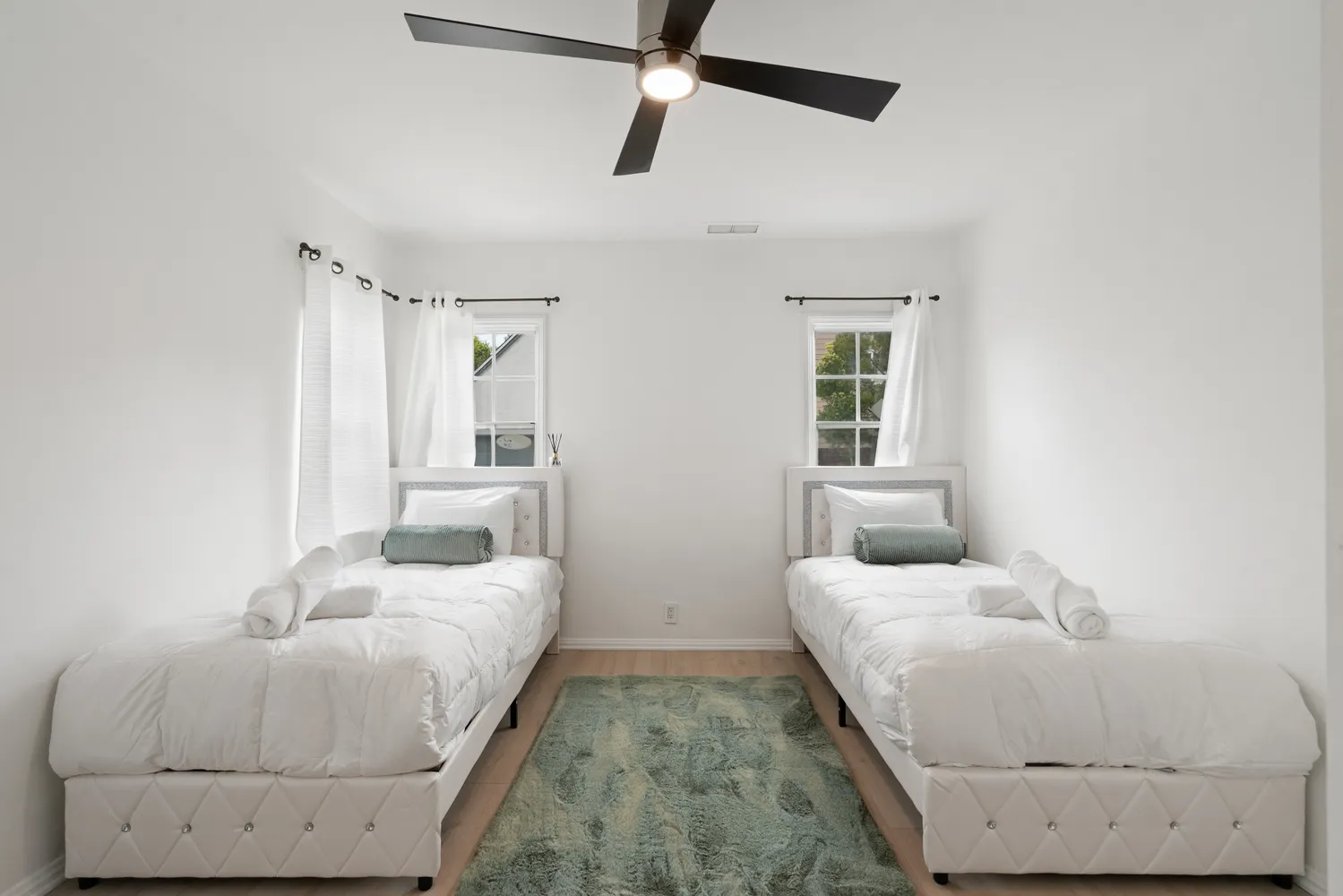 a bedroom with a bed and window