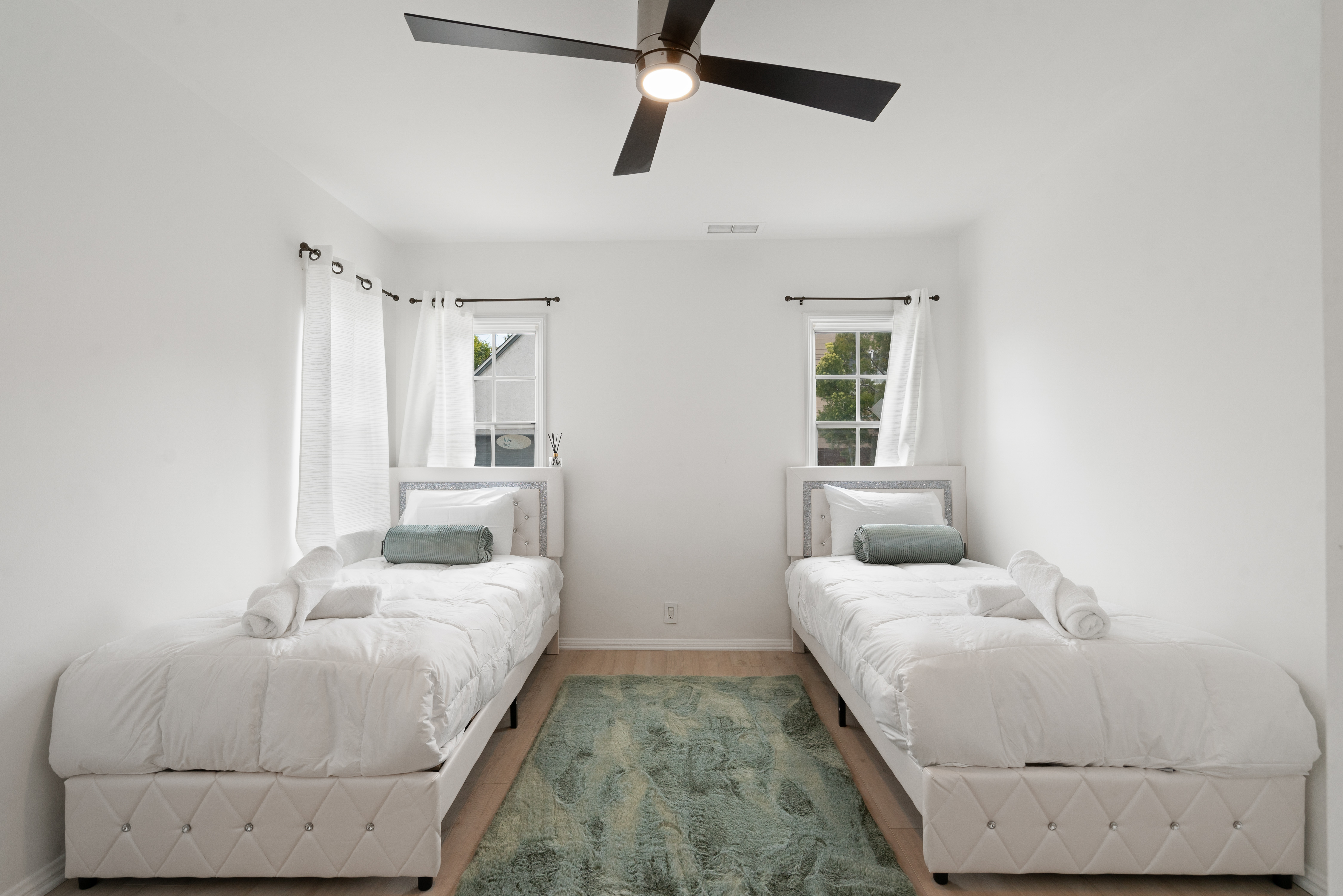 8832 Horner Street Los Angeles, CA 90035 - Photo 16 of 24 a bedroom with a bed and window