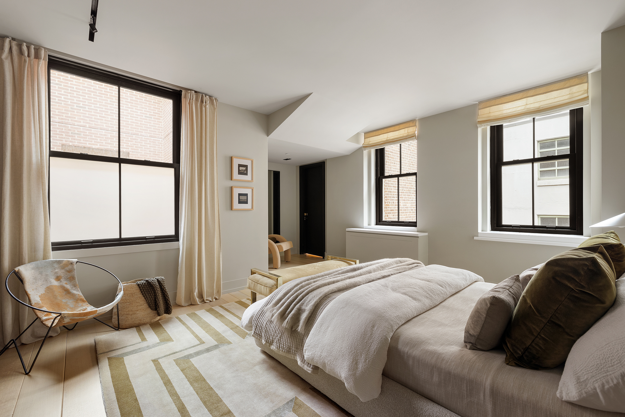 443 Greenwich Street, Unit PHD Manhattan, NY 10013 - Photo 12 of 32 a bedroom with a bed and windows