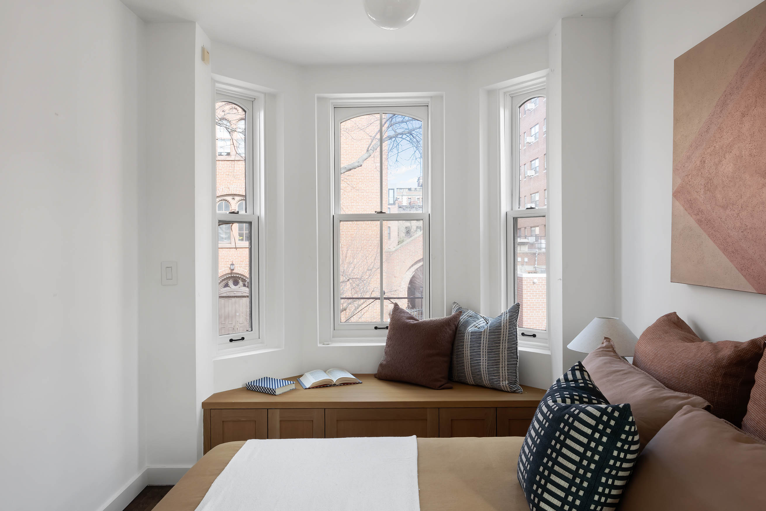 148 Warren Street Brooklyn, NY 11201 - Photo 12 of 20 a living room with furniture and a window
