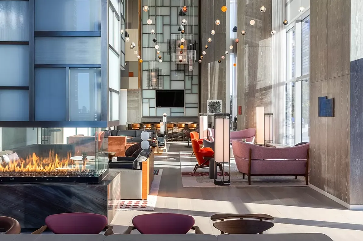 a room with furniture and a lamp