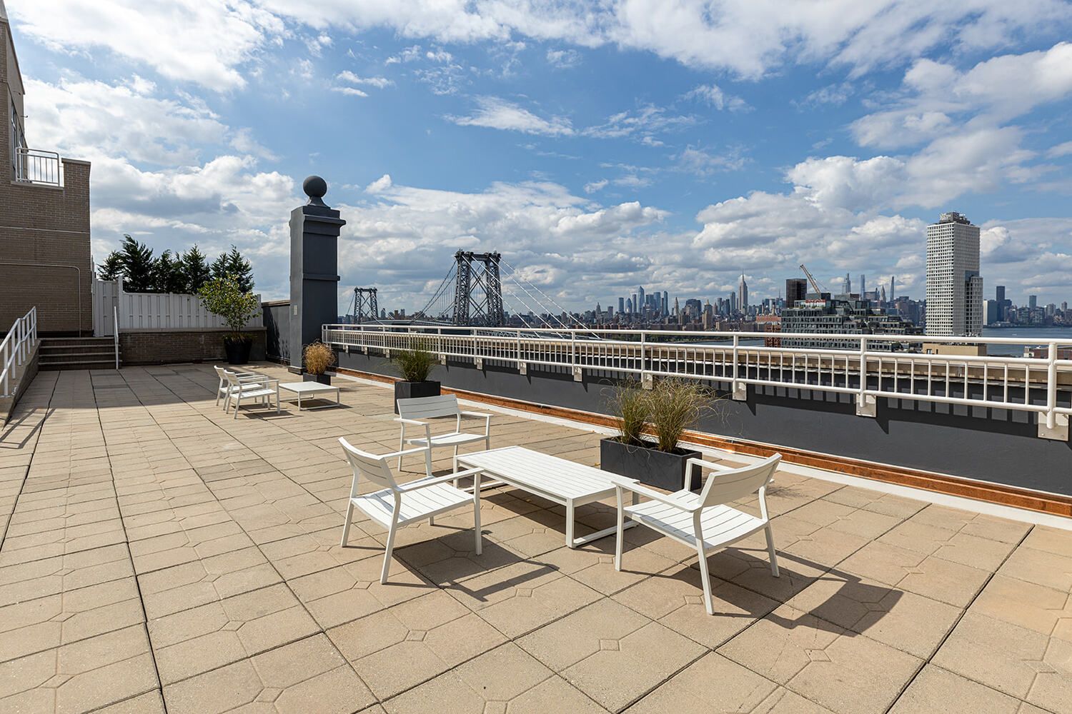 60 Broadway, Unit 6H Brooklyn, NY 11249 - Photo 12 of 16 a view of a terrace with furniture