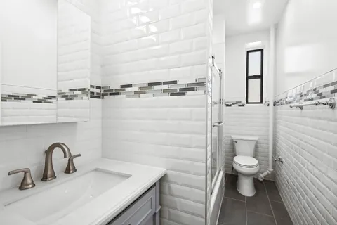 a bathroom with a sink and a toilet