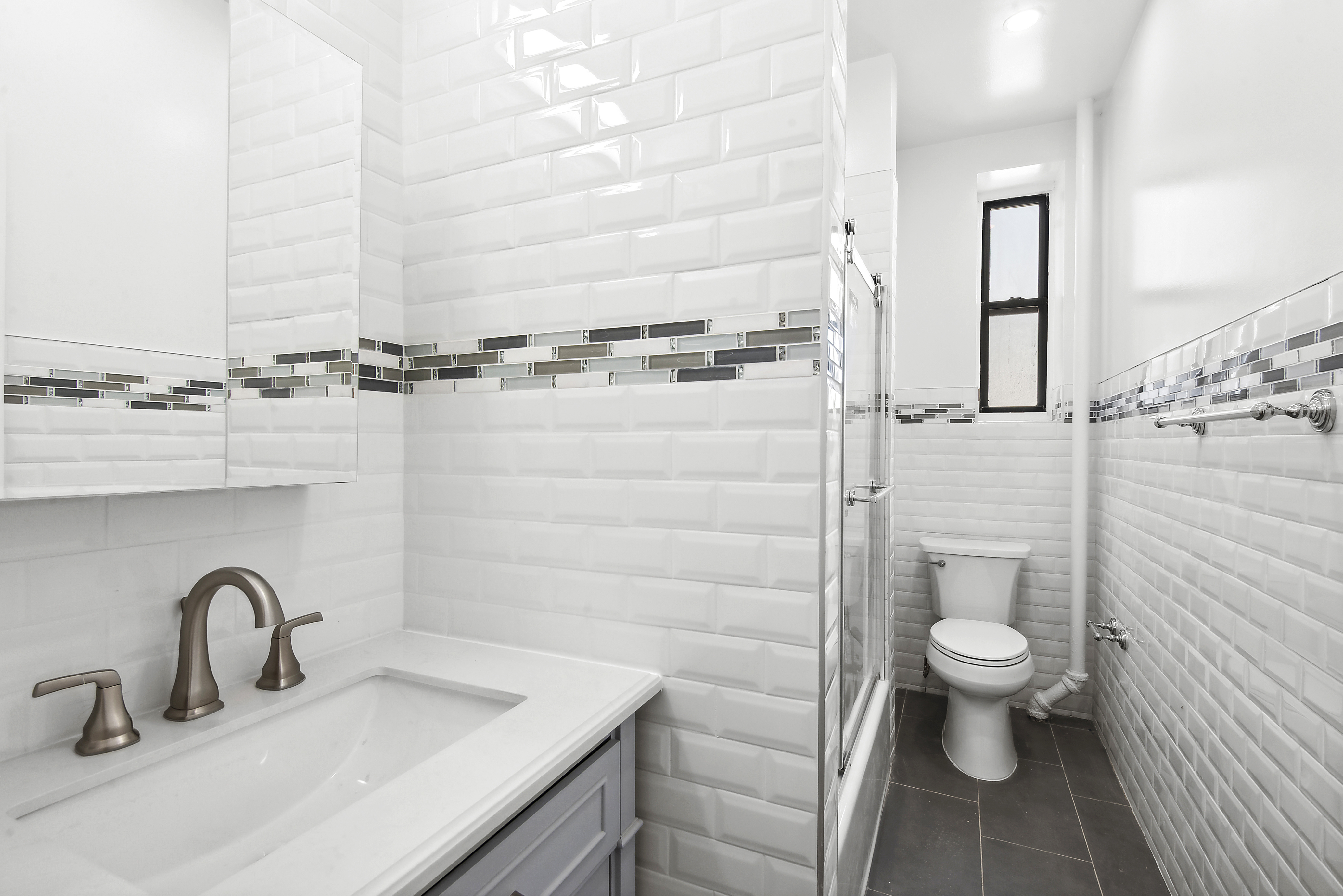 159-00 Riverside Drive West, Unit 2C-50 Manhattan, NY 10032 - Photo 11 of 20 a bathroom with a sink and a toilet