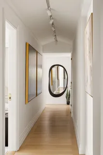 a view of a livingroom with wooden floor