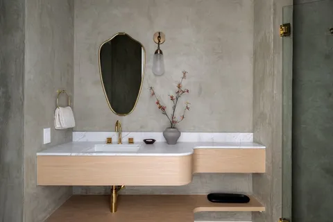 a kitchen with a sink and large window