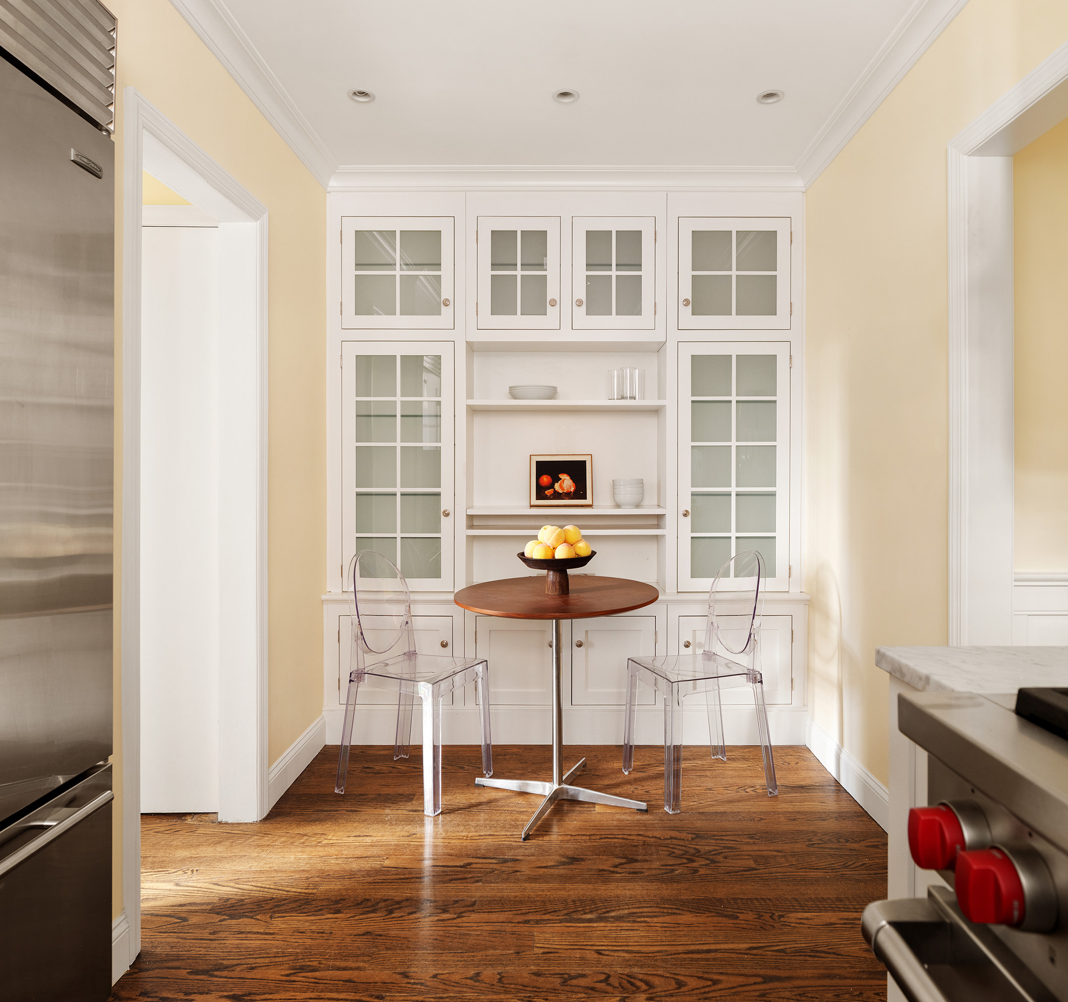 115 East 67th Street, Unit 3C Manhattan, NY 10065 - Photo 10 of 21 a view of a room with wooden floor and windows