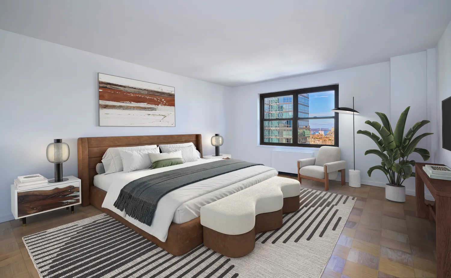 a bedroom with bed and a potted plant