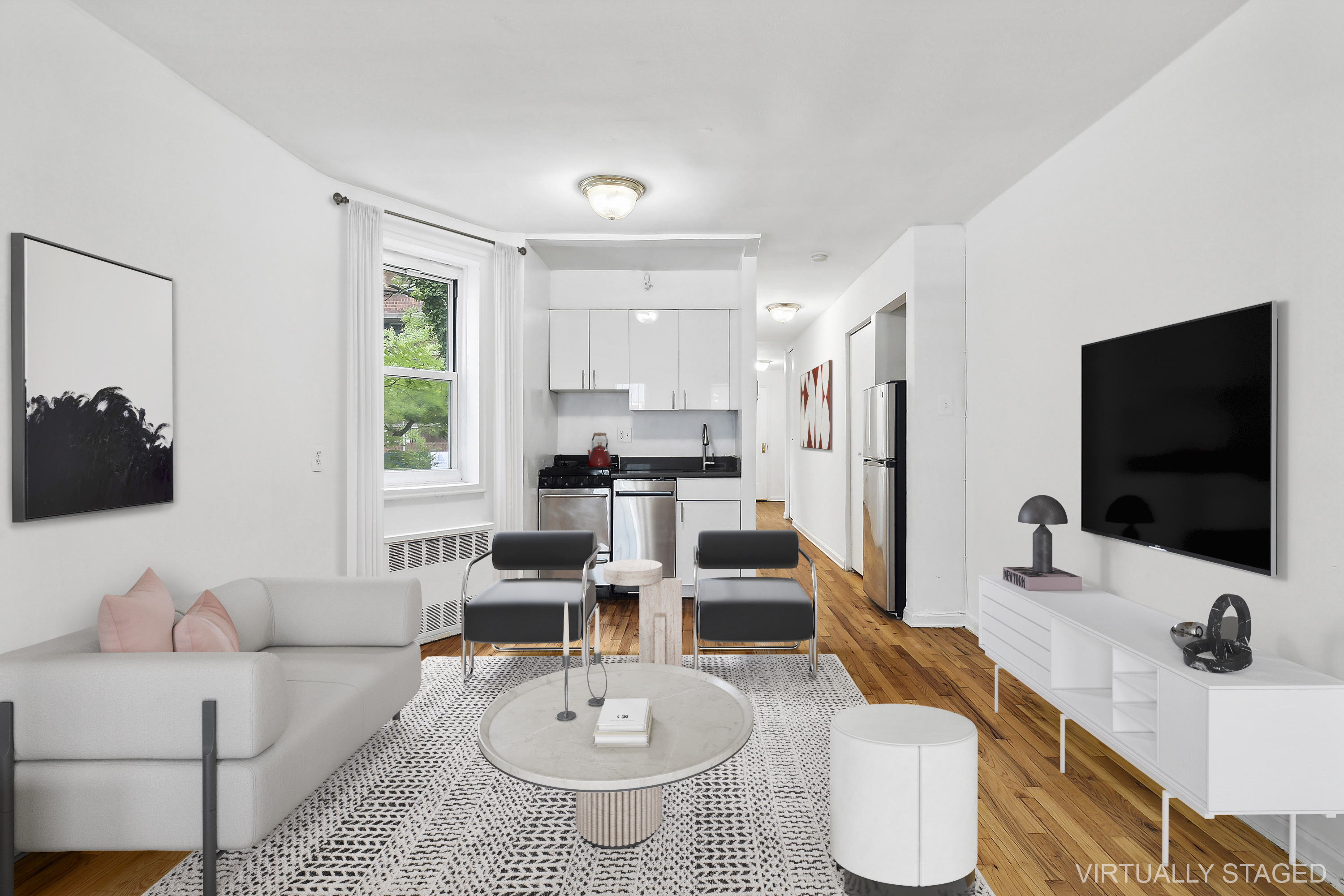 311 East 25th Street, Unit 2E Manhattan, NY 10010 - Photo 1 of 7 a living room with furniture and a flat screen tv