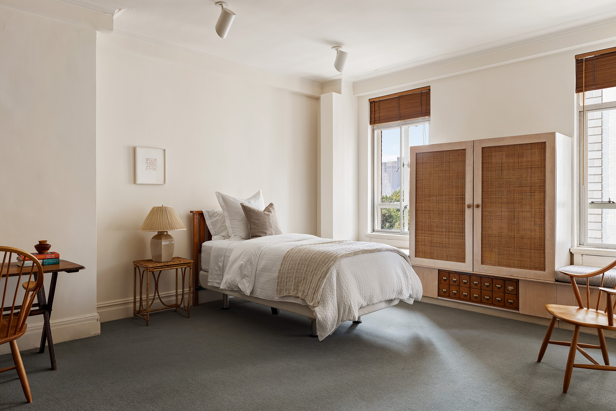 145-146 Central Park West, Unit 8C Manhattan, NY 10023 - Photo 14 of 17 a spacious bedroom with a bed chair and a window