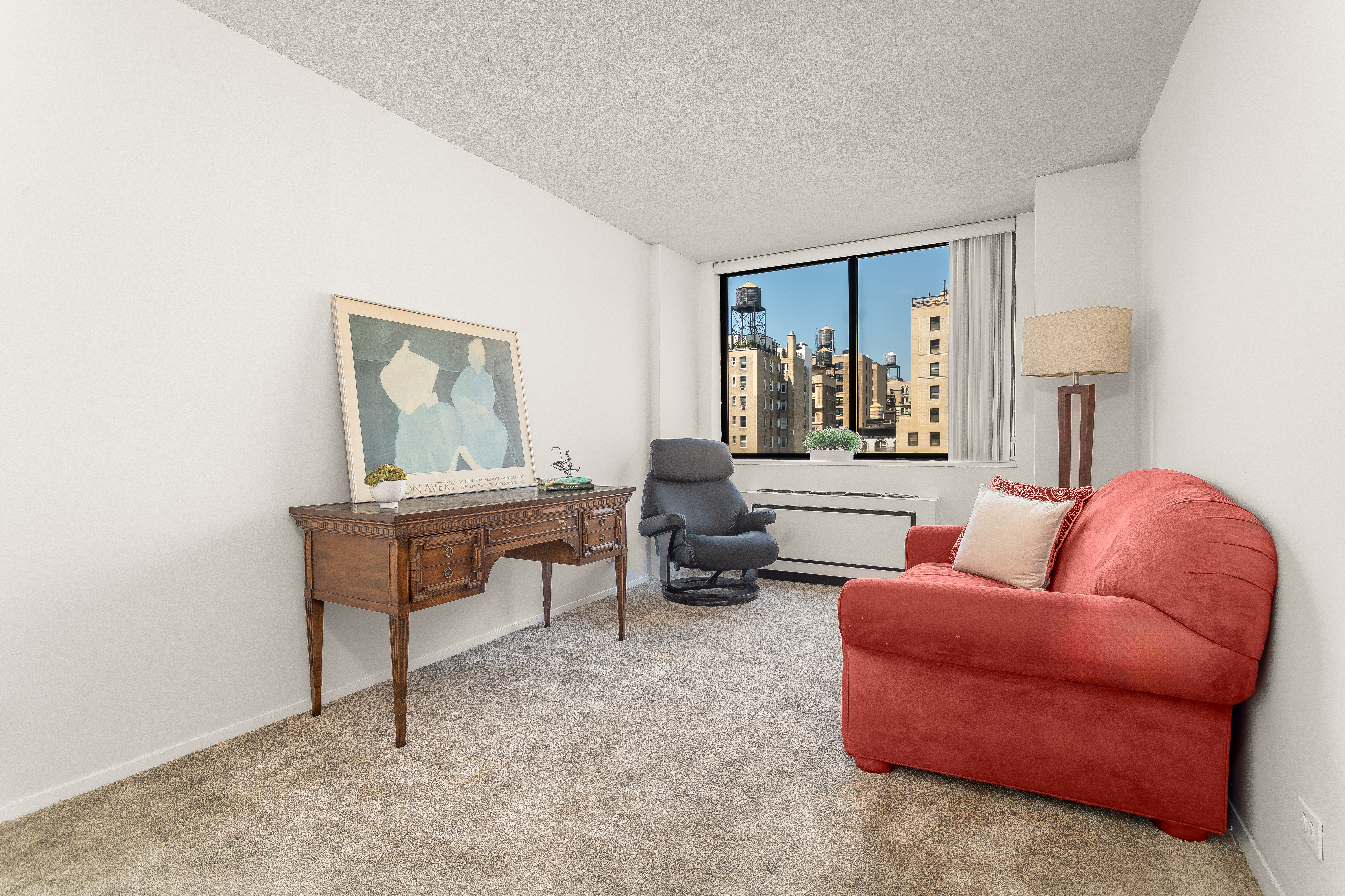 275 West 96th Street, Unit 12B Manhattan, NY 10025 - Photo 12 of 28 a living room with furniture and a window