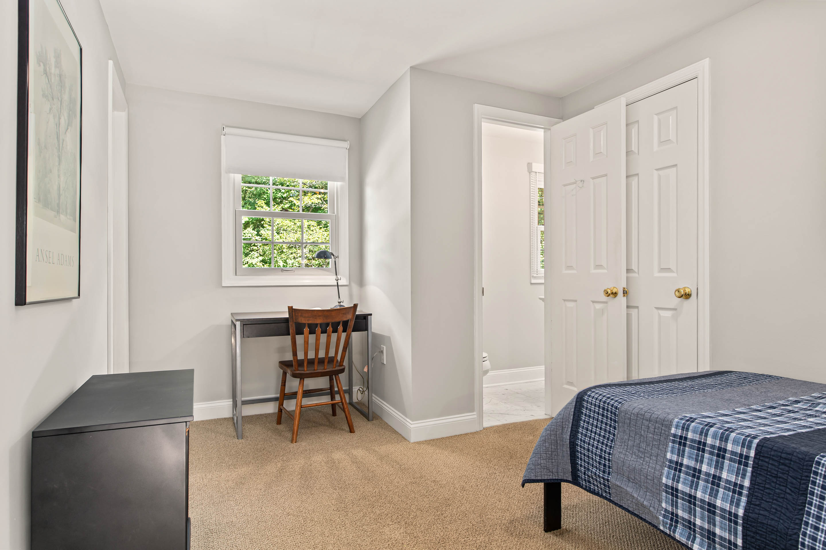 1136 Seaton Ross Road Wayne, PA 19087 - Photo 34 of 48 a bedroom with a bed and a table in it