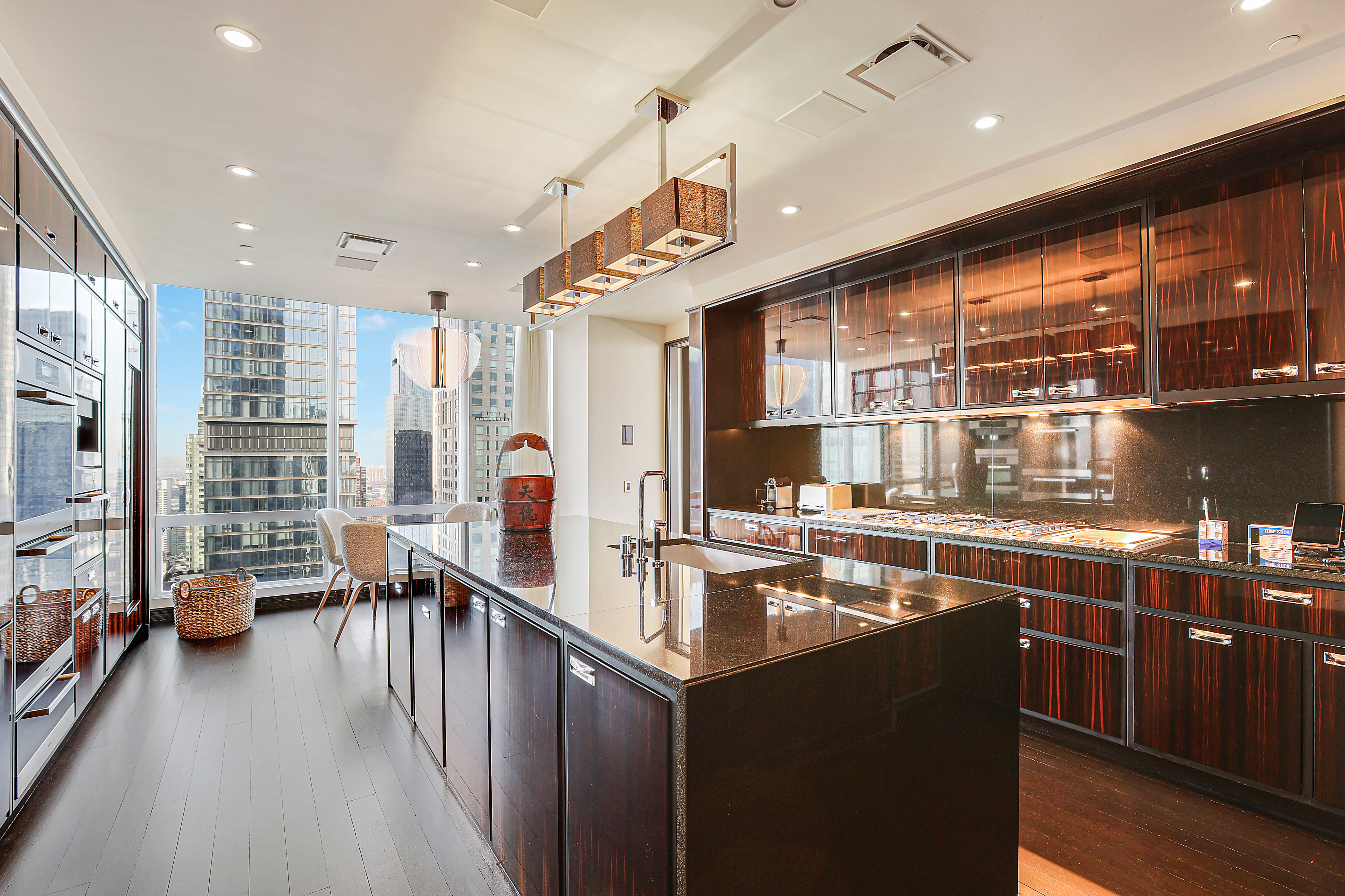 157 West 57th Street, Unit 51A Manhattan, NY 10019 - Photo 4 of 15 a kitchen with lots of counter top space