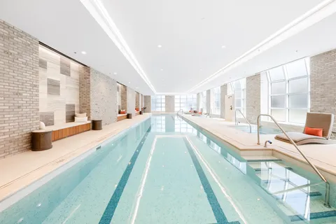 a view of a living room and kitchen